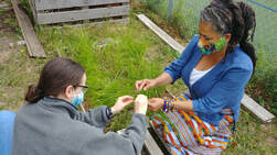 Braiding a traditional sweetgrass braid with a 2nd year medical student during a seminar on holistic health